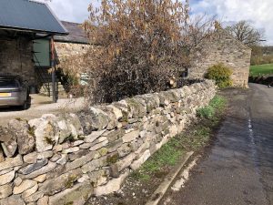 Rebuilt dry stone wall, Matlock, Derbyshire.